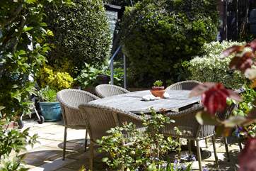 Enjoy the seating area in the garden.