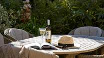 Enjoy the seating-area in the garden.