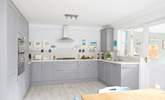 Cook up a family favourite in the stunning kitchen. - Thumbnail Image