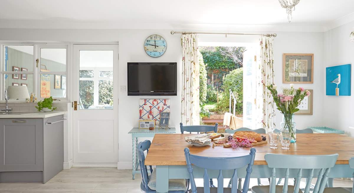 The kitchen table over looks the garden.