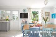 The kitchen table over looks the garden.