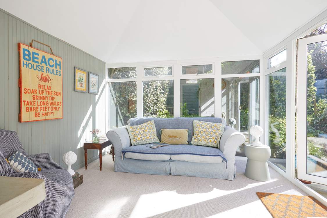 The conservatory is a great place to relax with a good book.