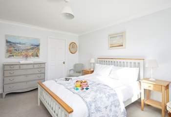 The main bedroom on the first floor is a delight and has the added benefit of an en suite bathroom.