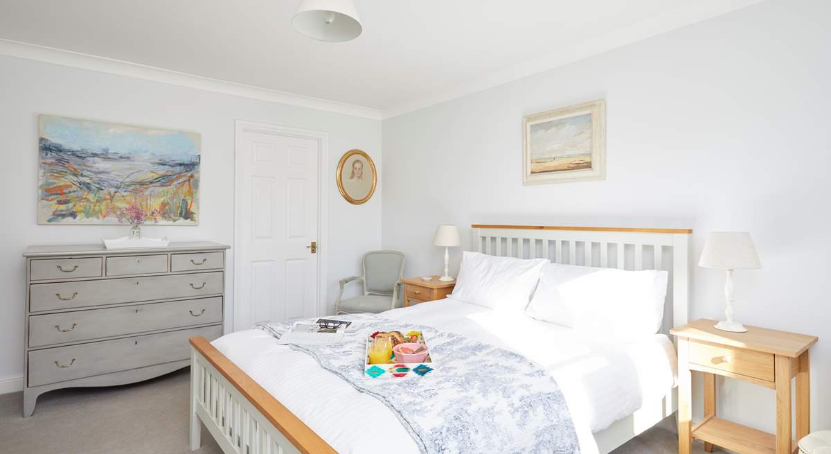 The main bedroom on the first floor is a delight and has the added benefit of an en suite bathroom.