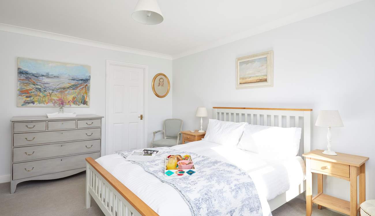 The main bedroom on the first floor is a delight and has the added benefit of an en suite bathroom.