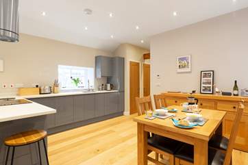 The modern and airy kitchen has all you need to cook your favourite meal.