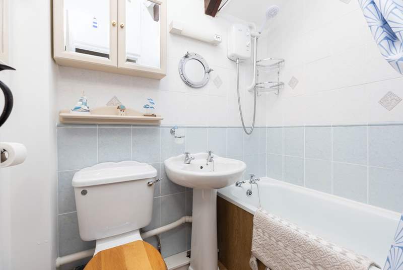 The family bathroom has the benefit of a bath with a shower over so you can choose between a long soak or a refreshing shower after a day on the beach.