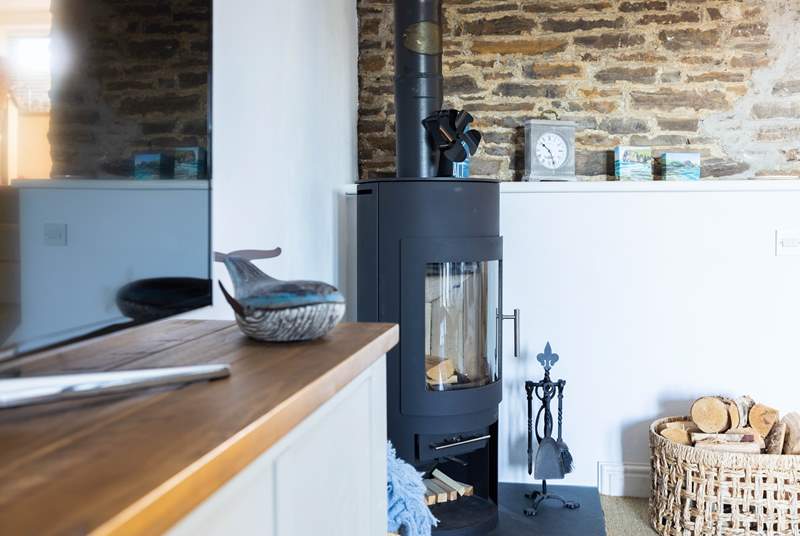 The wood-burner will keep you toasty during cooler months.