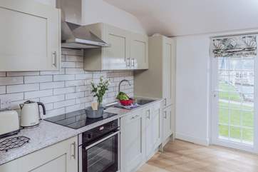 The lovely kitchen has everything you need to create delicious meals.