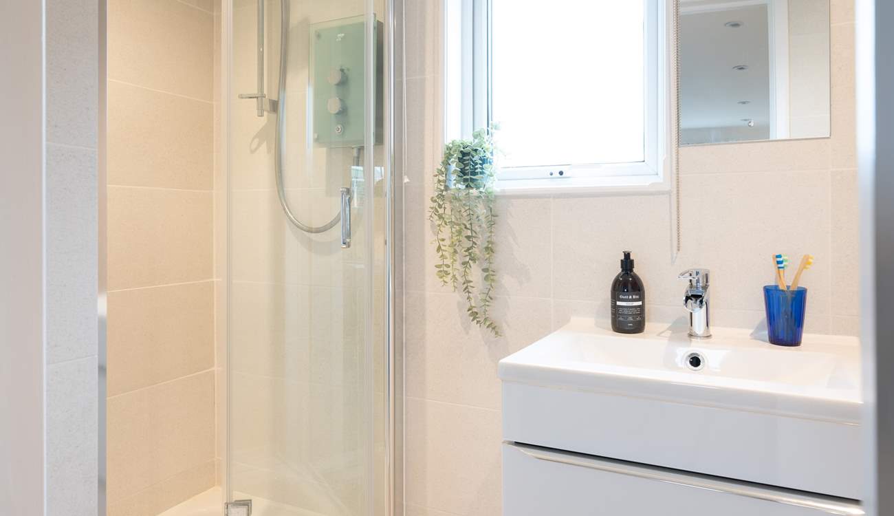 The en suite shower-room in bedroom 1 is perfect for a refreshing shower after a beach day.