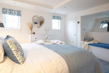 The very essence of a seaside holiday, bedroom 1 is decorated in blue and white shades and has a luxurious super-king size bed.