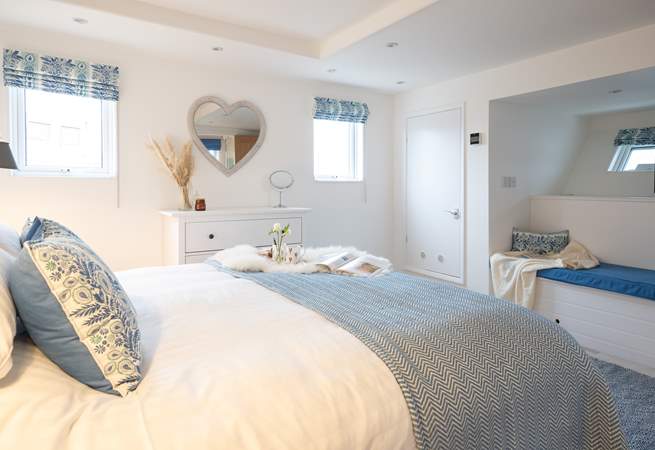 The very essence of a seaside holiday, bedroom 1 is decorated in blue and white shades and has a luxurious super-king size bed.