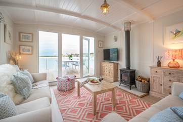 Sink into a comfy sofa and gaze at the dreamy view.