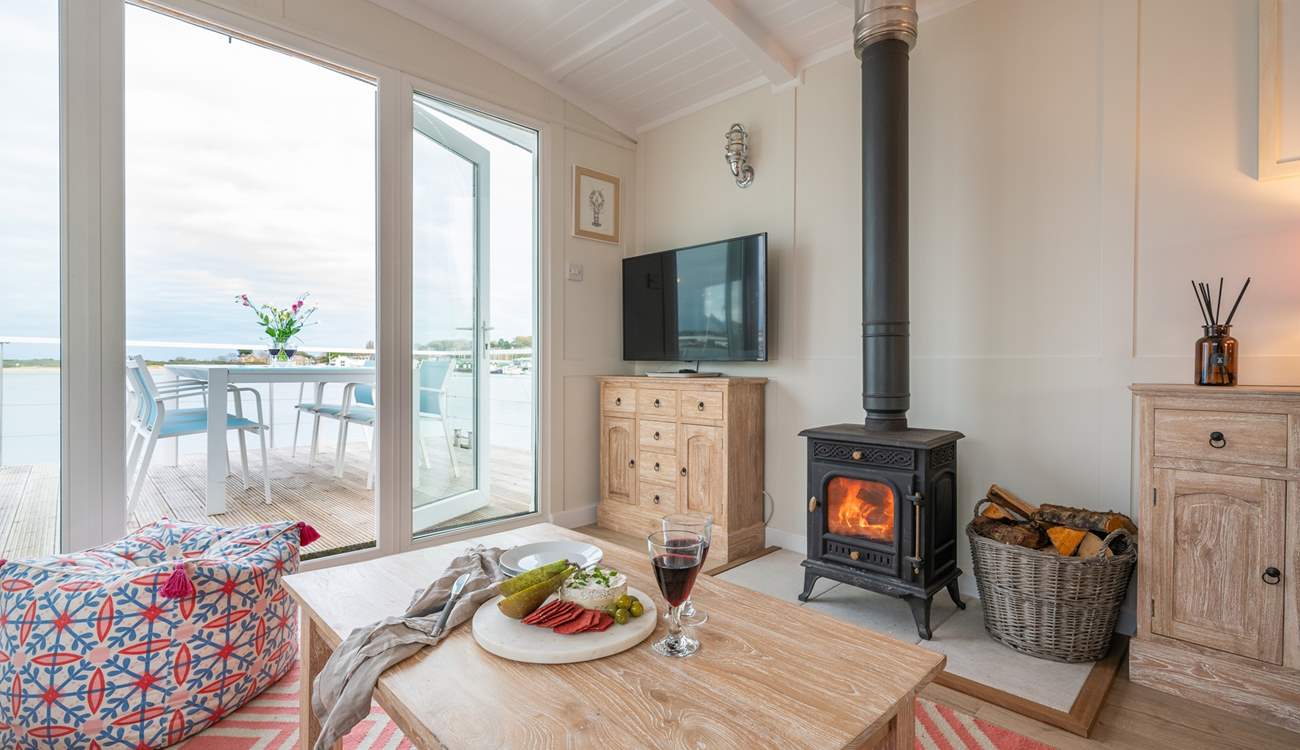 Enjoy cosy moments  by the glow of the wood burner.