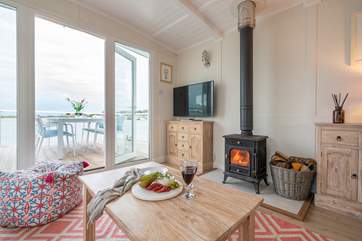 Enjoy cosy moments by the fire.