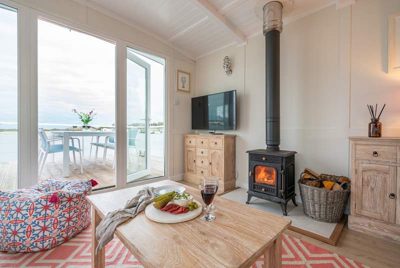 Enjoy cosy moments  by the glow of the wood burner.