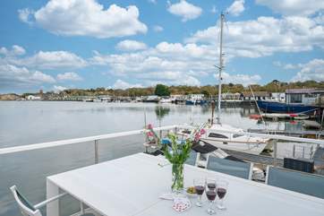 Watch the tide ebb and flow from the deck and admire the surrounding houseboat community.