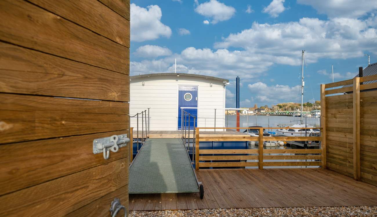From the two private parking spaces, Oystercatcher can be found through the wooden gate.