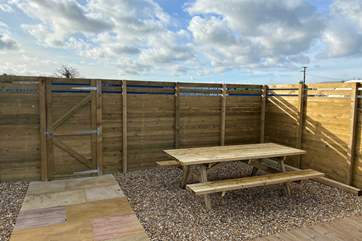 The front gravel area has a lovely seating area to enjoy.