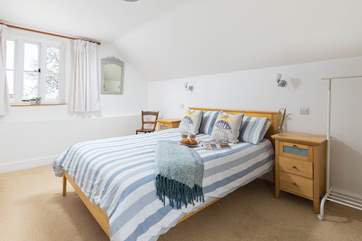 The bedroom has lovely views over the countryside.
