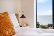 Treat yourself to morning coffee in bed, soaking in more of that view.