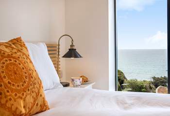 Treat yourself to morning coffee in bed, soaking in more of that view.