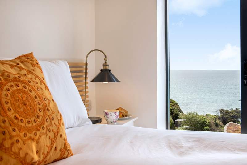 Treat yourself to morning coffee in bed, soaking in more of that view.