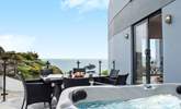 Step out onto the terrace to fire up the barbecue or to treat yourself to a soak in the hot tub. - Thumbnail Image