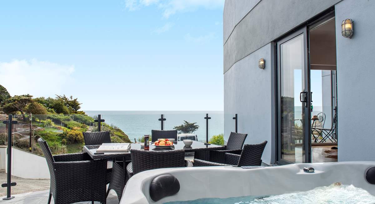 Step out onto the terrace to fire up the barbecue or to treat yourself to a soak in the hot tub.