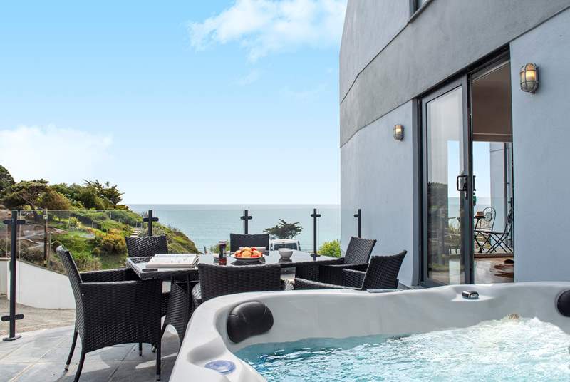 Step out onto the terrace to fire up the barbecue or to treat yourself to a soak in the hot tub.
