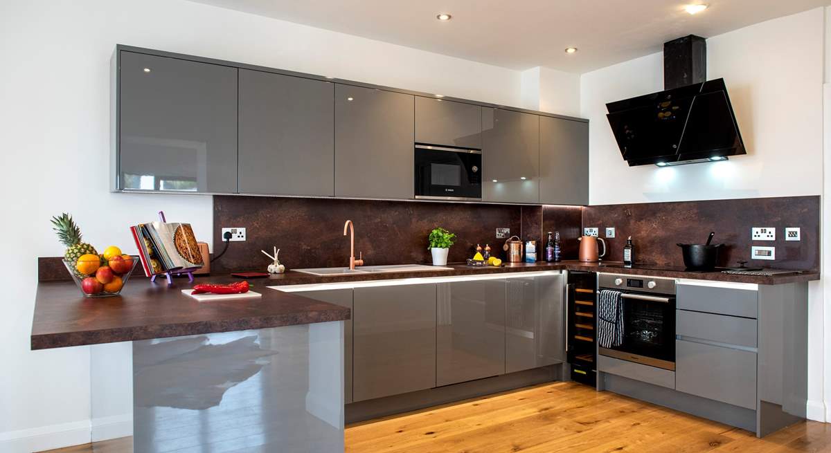 The kitchen is super stylish and has all you need to cook up a feast.