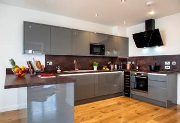 The kitchen is super stylish and has all you need to cook up a feast.