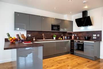 The kitchen is super stylish and has all you need to cook up a feast.