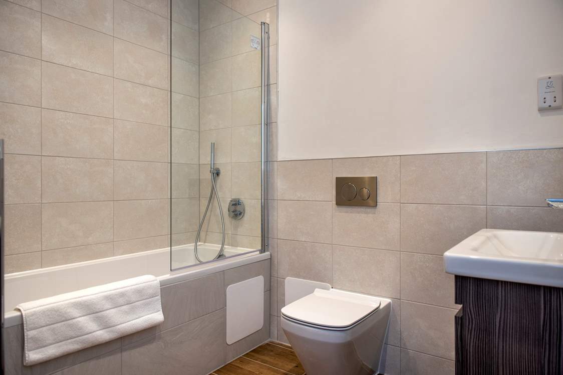 Bedroom 1 has its own en suite bathroom.