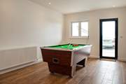 The pool table in the games-room will be a hit with young and old alike.