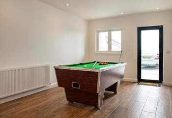 The pool table in the games-room will be a hit with young and old alike.
