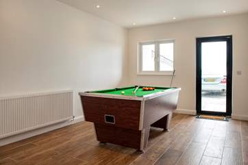 The pool table in the games-room will be a hit with young and old alike.