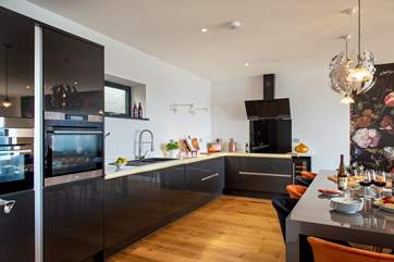 The kitchen is very stylish and has all you need to cook for a crowd.