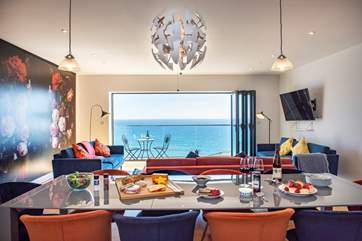 The open plan living-room takes full advantage of the view.