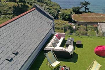 The roof terrace is a real treat and the place to relax and enjoy that view whether lounging in the deck chairs or soaking in the hot tub.
