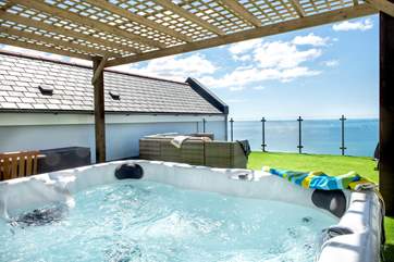 The roof terrace is a real treat and the place to relax and enjoy that view whether lounging in the deck chairs or soaking in the hot tub.