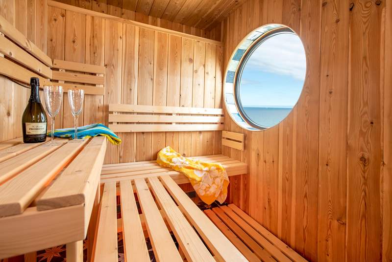 Look out over the sea as you sip some bubbles and enjoy the sauna.