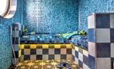 After a day at the beach, relax and unwind in the steam room. - Thumbnail Image