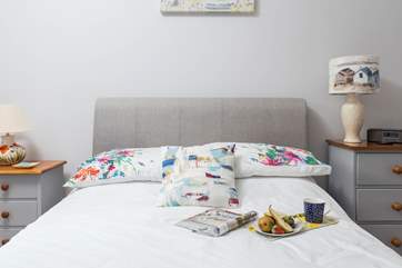 Bedroom three is vibrant and inviting.