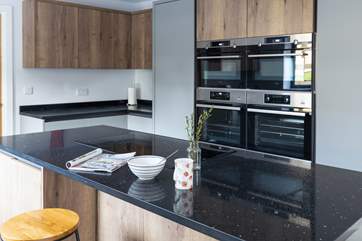 The double oven with built-in microwaves makes whipping up a feast a pleasure.