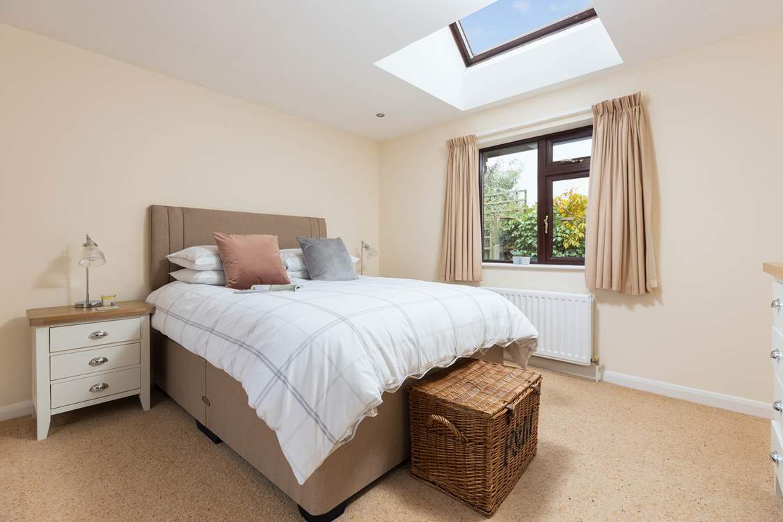 The main bedroom is home to this king-size bed.