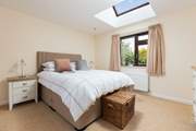 The main bedroom is home to this king-size bed.