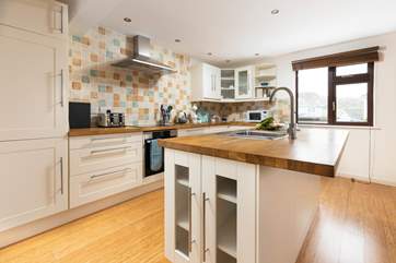 The well-equipped kitchen is a pleasure to cook in.