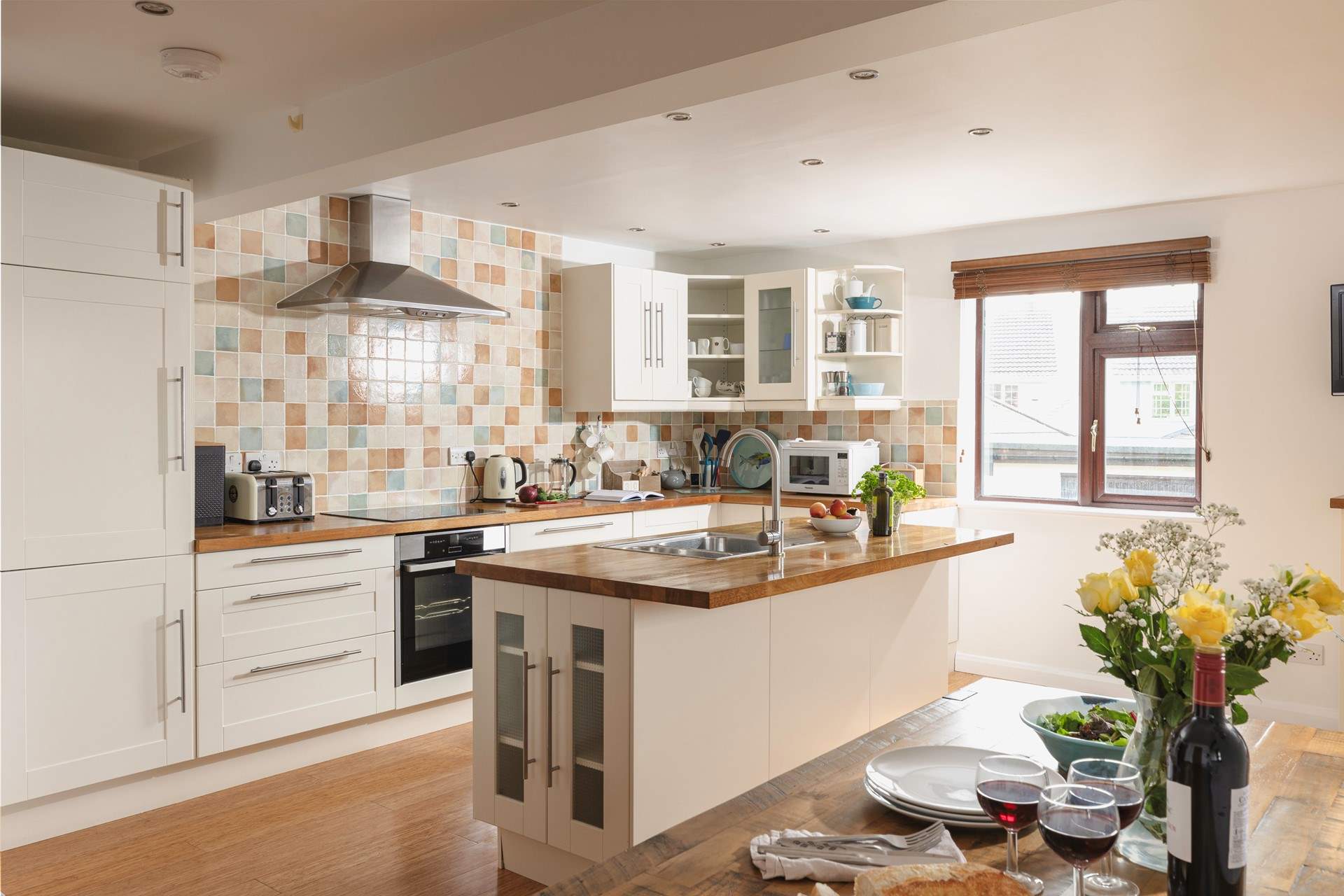 The spacious kitchen is a wonderful place to whip up and serve a holiday feast.