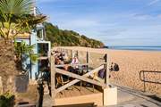 A bustling cafe and shops to complement any day out at this fabulous beach.